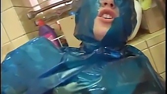 A Submissive Slave Encased In Plastic Gets Fucked