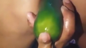 Stepmom Flaunts Her Open Ass By Using A Large Cucumber