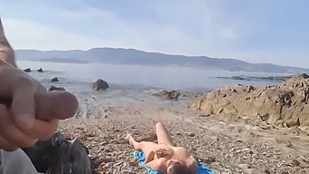 A Daring Man Exposes His Penis To A Nudist Mature Woman Who Performs Oral Sex On Him At The Beach